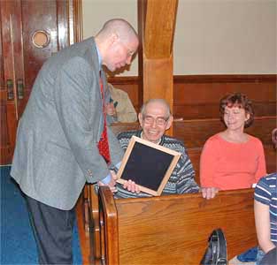 Bob Schmitt receiving his plaque